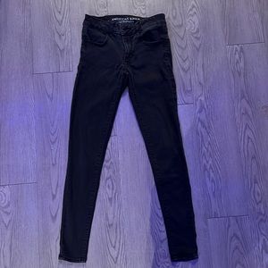 A pair of black skinny jeans